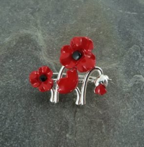 growing poppy brooch